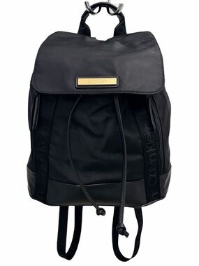 Calvin Klein Black Nylon Drawstring Flap Backpack Gold Logo and pockets
